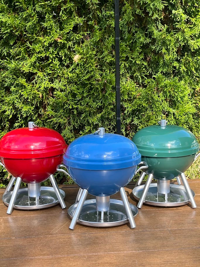 3 BBQ shaped Birdfeeders against a greenery background